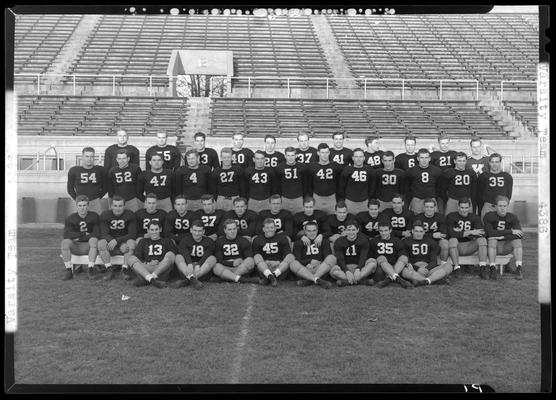 Football, (1940 Kentuckian) (University of Kentucky); Varsity Team group portrait, members on the field