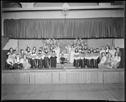 Ashland School (195 North Ashland Avenue); Christmas Concert; students in costume singing Christmas carols on stage