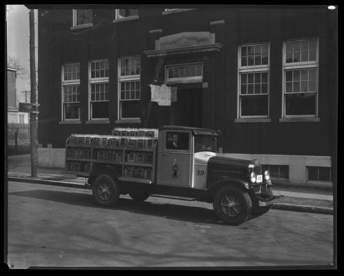 Coca-Cola Bottling Works, 541 West Short; trucks (Harbison Tire Company?)