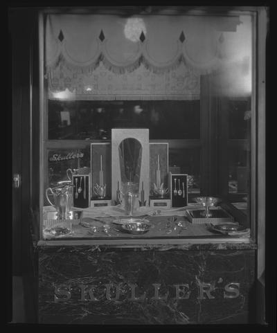 Harry Skuller, jeweler, 115 West Main; exterior window display