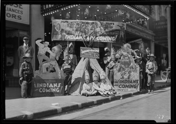 State Theatre (movie theater), 220 East Main, exterior; children dressed as Native-Americans to promote 