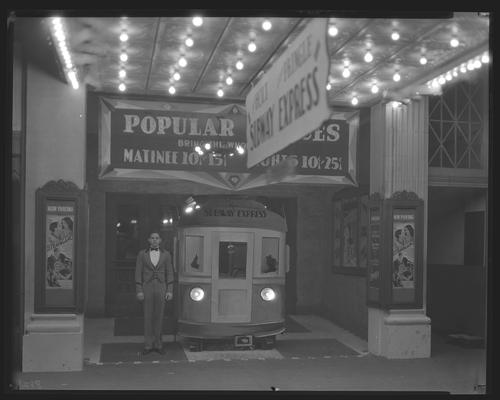 State Theatre (movie theater), 220 East Main, exterior; ticket booth decorated to promote 