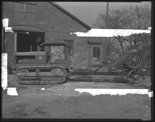 Wilson Machinery & Supply Company, 139-141 North Mill; tractor & crusher