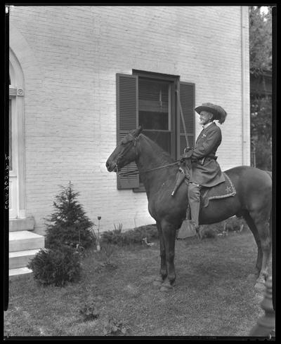 Colonel Dick Redd (in dress uniform); on horse