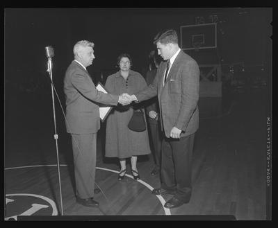 LSU game. Schnilenberger receiving all-American Trophy 1955