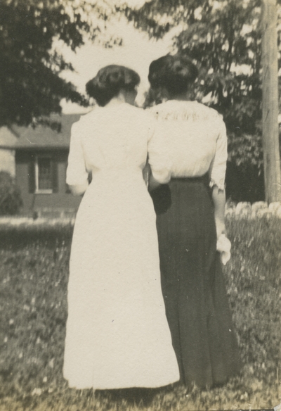back view of 2 women