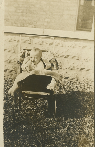postcard, a baby in a baby carriage