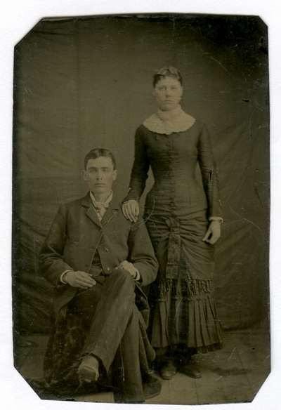 Hand-colored group portrait of an unidentified couple
