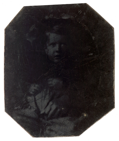 Portrait of an unidentified boy, on right, in an eight-sided case