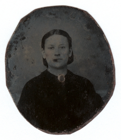 Portrait of an unidentified woman in an oval case.  Hand written note says, 