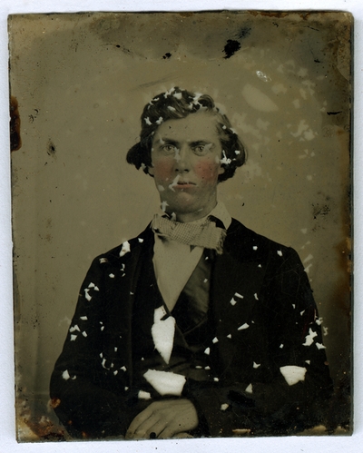 Hand-colored portrait of an unidentified man in a rectangular case