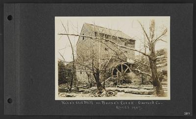 Wood and stone building with mill, surrounded by stumps and poossibly dead trees, notation                          Rice's Old Mill on Boone's Creek, Garrard Co, Apr. 28. 1907