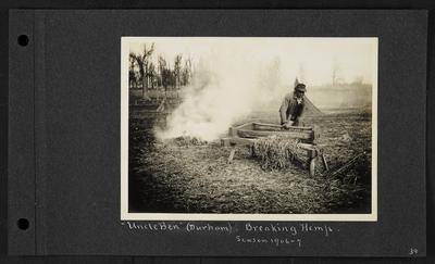Man placing hemp in wooden device, burning hemp to left, notation                          Uncle Ben (Durham) - Breaking Hemp - Season 1906-7
