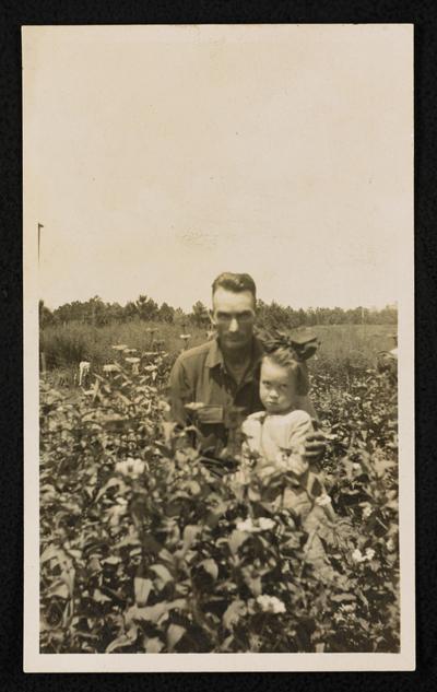 Fred Reese, a returned soldier, student of the Mill Village Adult School. The little girl is Irene Davis, his niece and his idol of the home