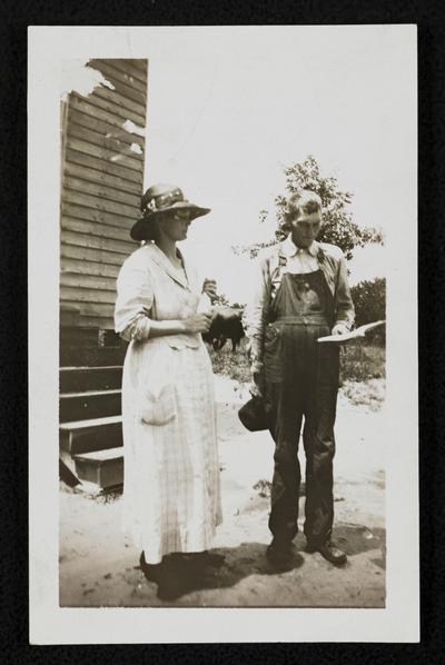 Mr. Tom Weaver and Adult School pupil from Polk School House. Crenshaw County, and his teacher, Miss Nancy Croxton. Aug. 1920. Mr. weaver took his noon hour from the mill to learn to read, write, and work arithmetic