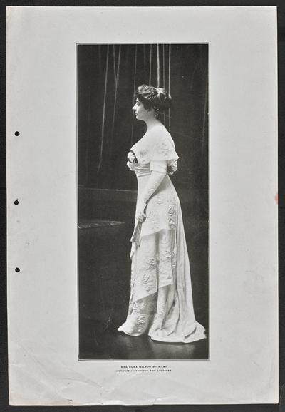 Full-length, formal portrait of Cora Wilson Stewart, bottom of the photograph reads: Institute Instructor and Lecturer
