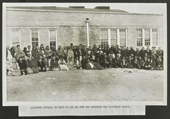 Large group photographs of Native Americans, posing outdoors. Bottom of the photograph reads: Blackfeet Indians, 60 years of age and older who attempted the illiteracy clinic