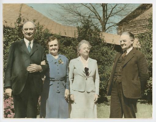 Cora Wilson Stewart as an elderly woman with another woman and two men