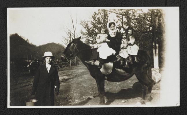 Kentucky students. Back of the photograph reads: Going to Moonlight school, Adams School, Rowan County, Kentucky. 1913