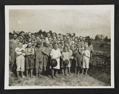 Kentucky students. Back of the photograph reads: Children of Marshall County who will be better served of life because their parents even late in life are going to school