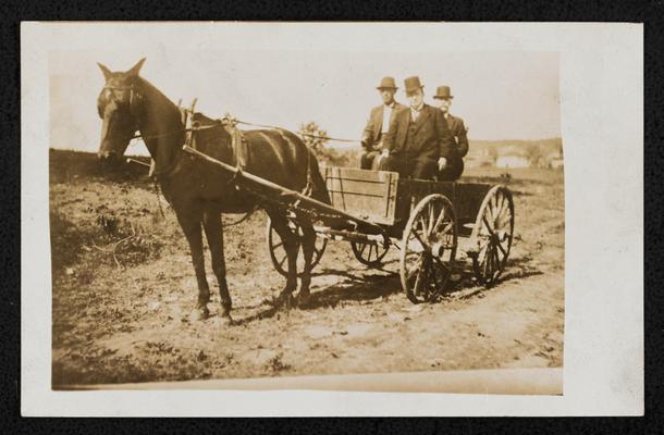 Senator George Ferris and Governor James B. McCreary, Kentucky's Governor travelling in a folk wagon to the county seats of a remote county. Governor McCreary and Senator Ferris in McCreary County, Kentucky for McCreary County School Rally