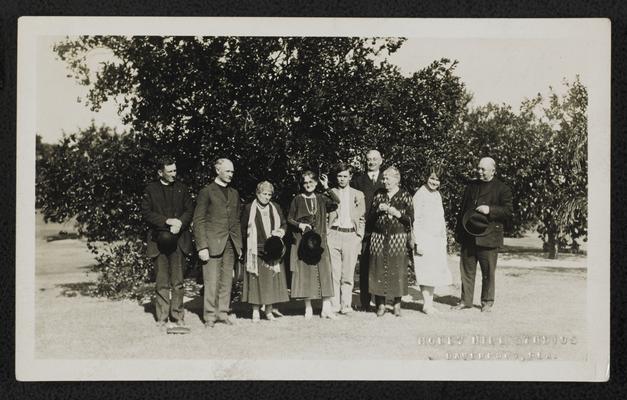 Group photograph with Reverend and Mrs. Noe, taken in front of Holly Hill Inn, Davenport, Florida. photograph sent to Mrs. Cora Wilson Stewart