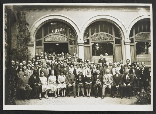 A large group photograph with Cora Wilson Stewart, at the same location and most likely from the same day as item #67