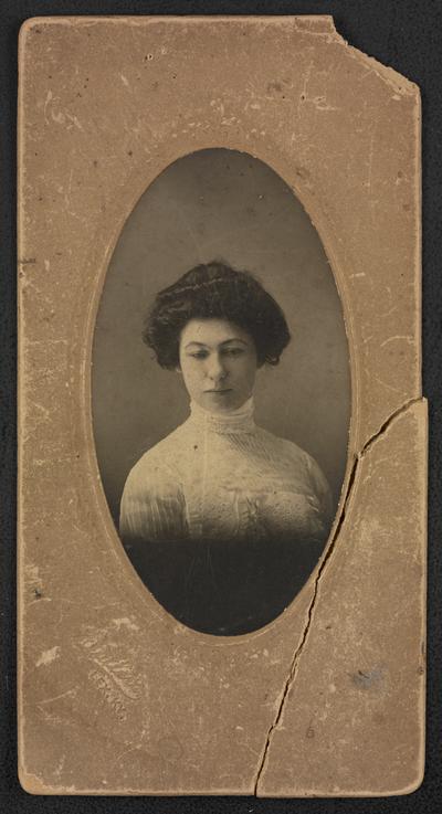 Formal portrait of Cora Wilson Stewart. The back of the photograph reads: Beginning of Career: Cora Wilson daughter of Dr. Wilson--Morehead, Kentucky. Elected County Superintendent of Rowan County Schools, served 8 years (2 terms). 56 schools (all moutains), 75 teachers, took several weeks to get around either on horseback or buckboard