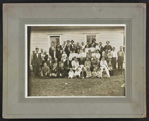 Kentucky students. Back of the photograph reads: Moonlight School in Adair County, Azro hadley, teacher