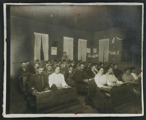 Kentucky students. Back of the photograph reads: Night School at Open Fork, Rowan County, 70 enrolled, oldest pupil 73 years old. Young people whose chance had come