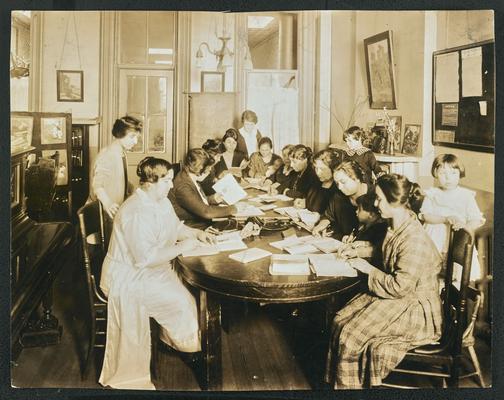 New York students. Back of the photograph reads: Class at Little Italy Neighborhood House, 146 Union Street, S. Brooklyn, New York. Miss Jannicelli-teacher