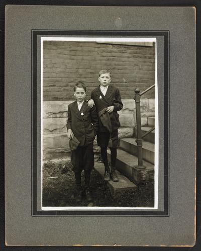 Male students, unidentified. Back of the photograph reads: Twins who took prize for daily attendance