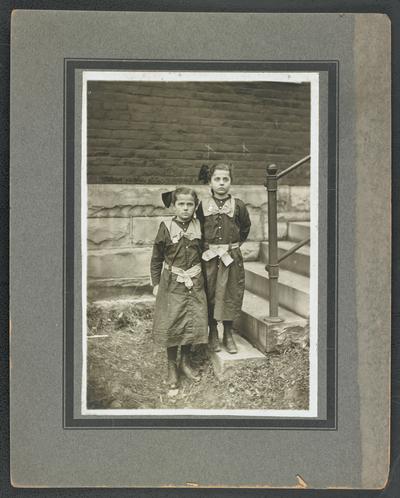 Female students, unidentified. Wearing the same medals as the young boys in item #392