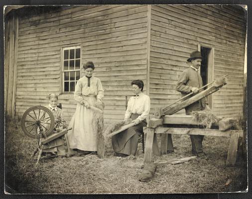 Mrs. Morefield, teacher. Back of the photograph reads: Process of weaving at Mrs. Morefield's