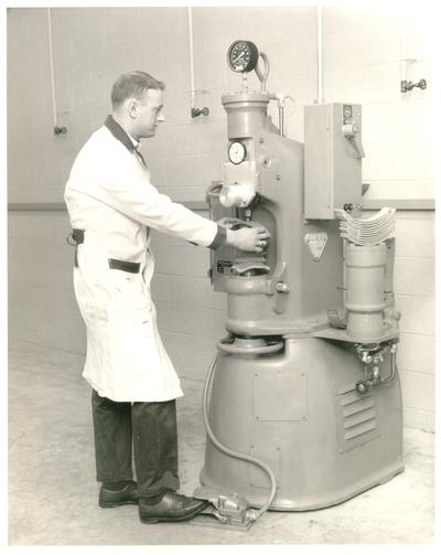 Advertising photographs; Man using a Gogan brand machine