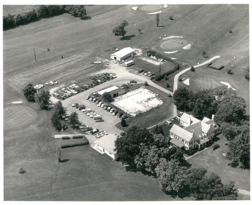 Aerial photographs; Aerial view of a clubhouse and pool at a golf course