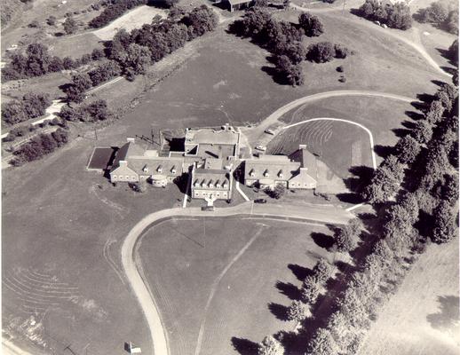 Aerial photographs; Aerial view of a large building, possibly an estate