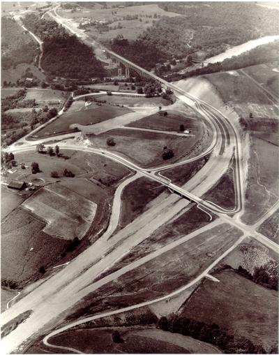 Aerial photographs; Aerial view of road construction at a junction, bridge and river