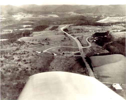 Aerial photographs; Aerial view of roadside service station