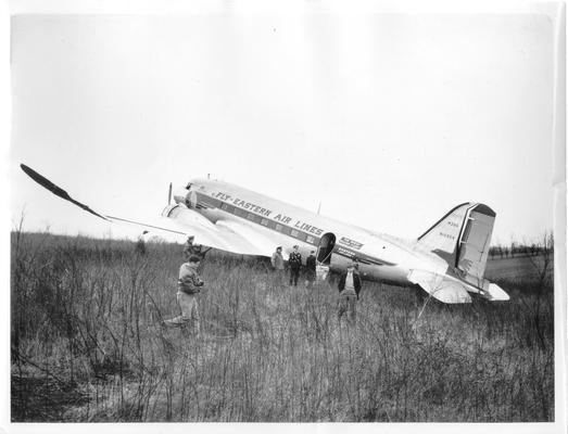 Airplane crashes; Another view of the Eastern airlines commercial plane landed in a field. same plane as #92, 94