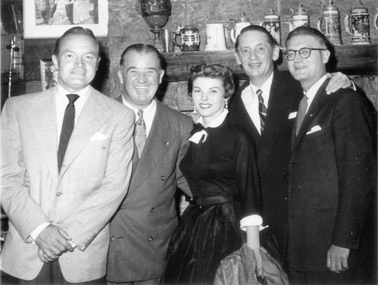 Hope, Bob; Bob Hope, three men, and a woman pose for a picture