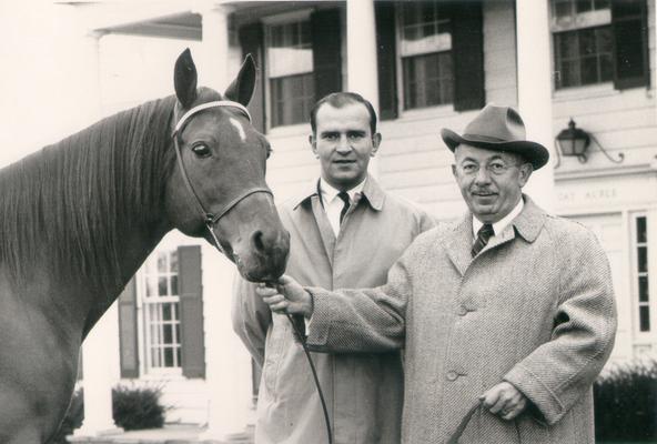 Horse Farms and Owners; Gainesway Farm; John Gaines and unidentified man with horse