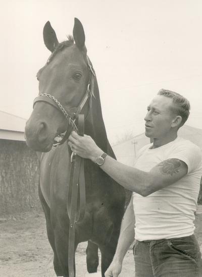 Horse Farms and Owners; Gainesway Farm; Man with large tattoo and horse