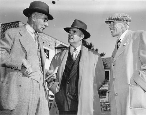 Horse Industry; Unidentified; Three men talking