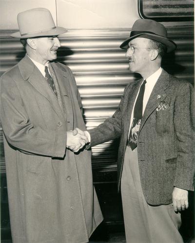 Horse Industry; Unidentified; Two men shaking hands