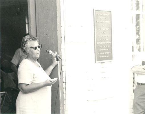 Horses; Harness Racing; The Red Mile; The Standardbred Stable of Memories; A woman with a microphone dedicating the McMurtry Floral Hall