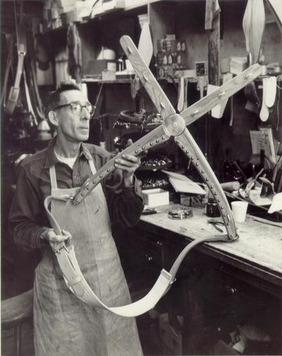 Horses; People Working with Tack and Horse Accessories; Showing off a newly built accessory