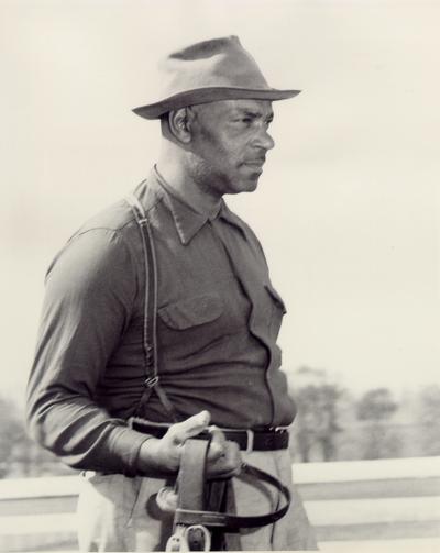 Horses; People Working with Tack and Horse Accessories; R.B. Carter, a groom at Crown Crest Farm