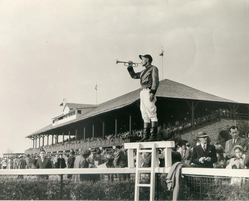 Horses; Thoroughbred Racing; Keeneland; Scenes at the Track; A jockey signals that it is time for the race to begin