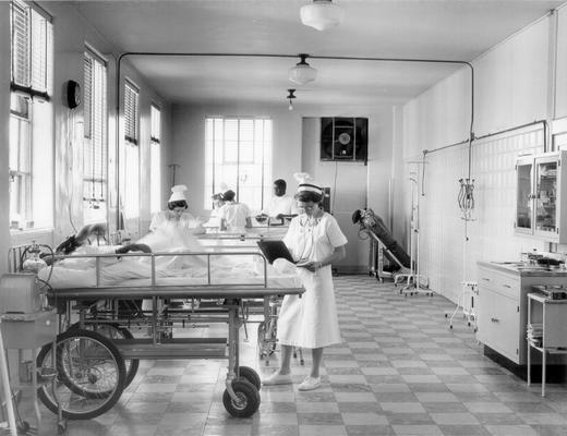 Hospitals and Medical; Nurses checking on patients in the hospital